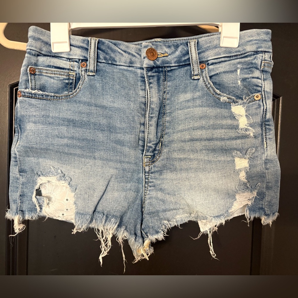 Vintage Light Blue Distressed Denim Women's Shorts with peakaboo Lace Pockets